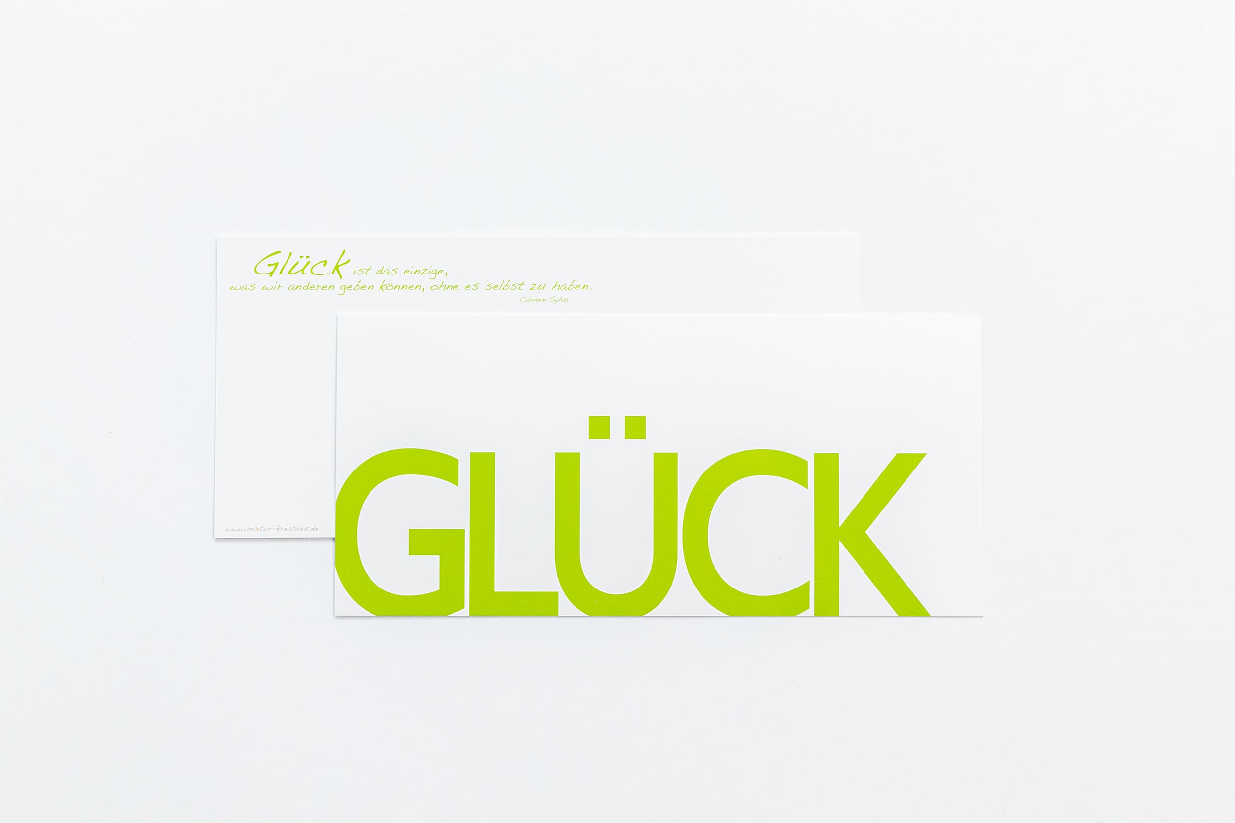 Grußkarte "GLÜCK" als Postkarte mit Rückseite