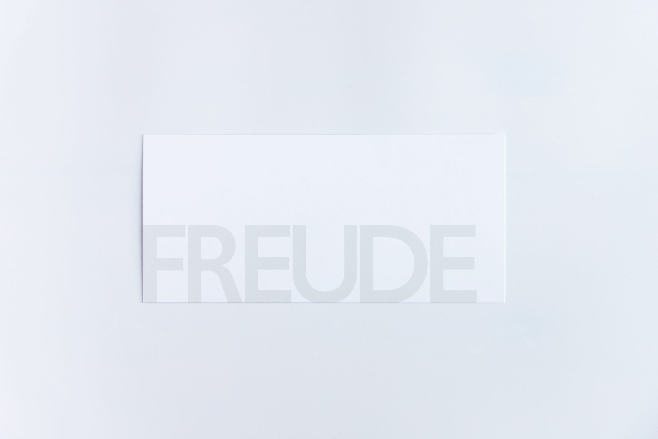 Grußkarte "FREUDE" mit weiß-grauem Briefumschlag und Rückseite