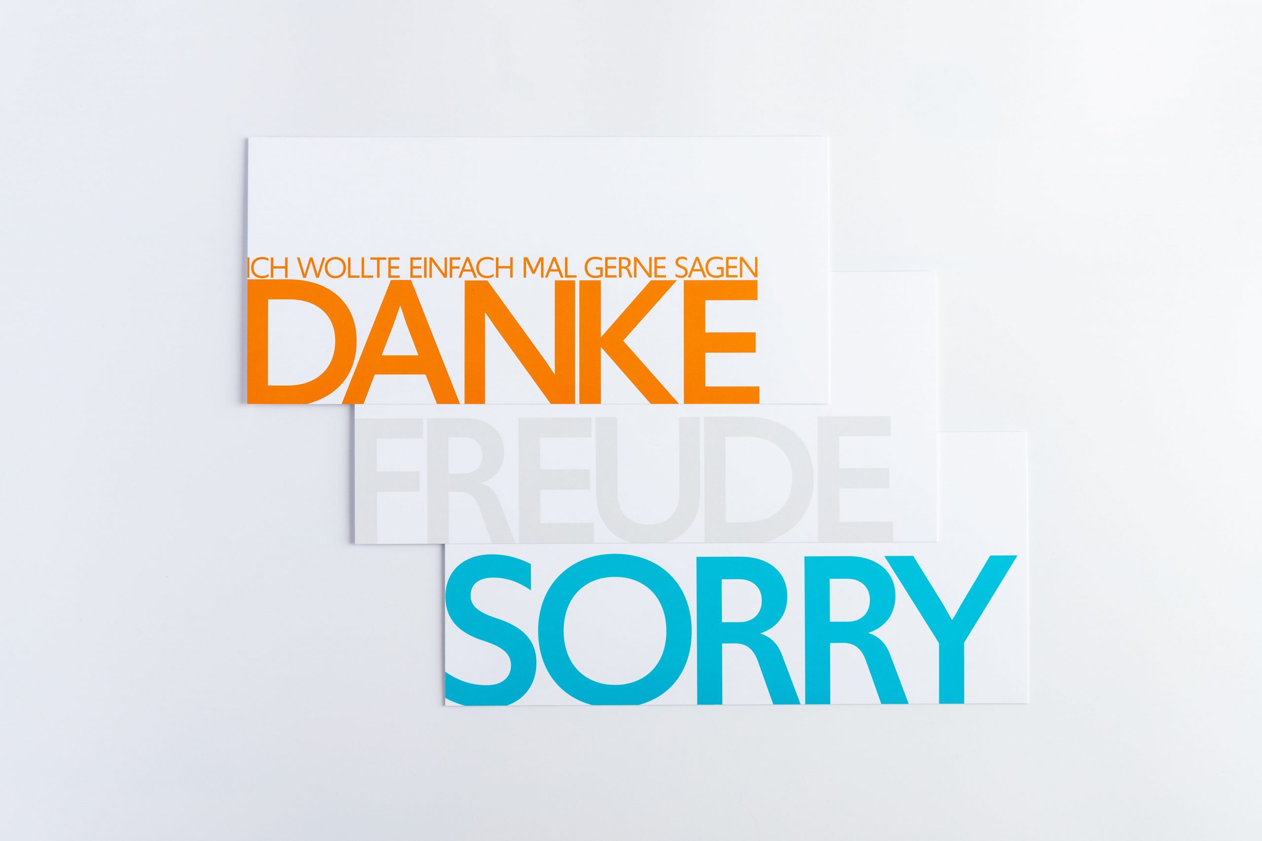 Grußkartenset "SOS" bestehend aus den Wörterkarten "DANKE", "FREUDE" und "SORRY"